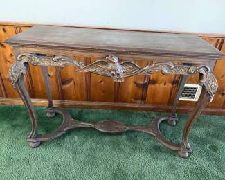 $75.  CONSOLE TABLE ANTIQUE CARVED EAGLE.                                               47” x 17.5” x 32” tall. Wonderful Original Finish. Beautifully carved Eagle & Oak Leaves. Early bun feet. This is very nice with one repair that needs to be re-glued to close the gap , remains totally functional as-is.