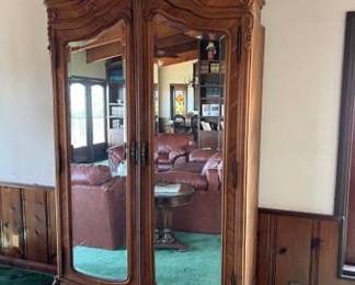 $75.  ARMOIRE BEVELED MIRROR DOORS BAR CABINET ANTIQUE.     FAIR-good condition the back has been taken off and could easily be nailed back . This cabinets breaks down into 6 pieces. The doors lift off their hinges. The top crown comes off and so does the base
