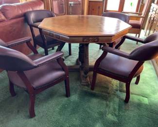 $75. POKER & BRIDGE CARD TABLE ANTIQUE w/ 4 captain chairs.    measures 44” octagon top This super sturdy table is antique and only a portion of the top needs sanding and re-coating. Upholstery is excellent on all 4 contemporary captain chairs.