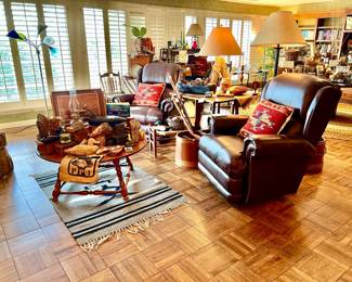 Relax in the den with duck decoys and La-Z-Boy leather recliners, like new.