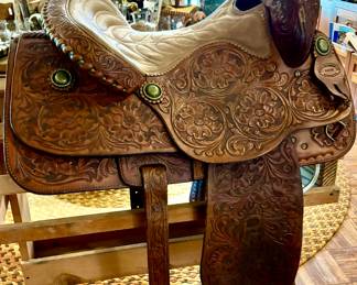 Custom made hand tooled leather saddle with conchos by Price McLaughlin. More pics farther below. 