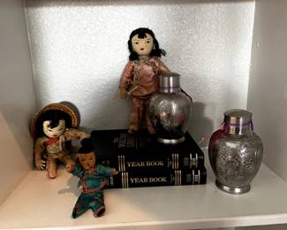 Books, vintage decor and dolls.