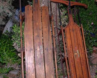 VINTAGE SNOW SLEDS