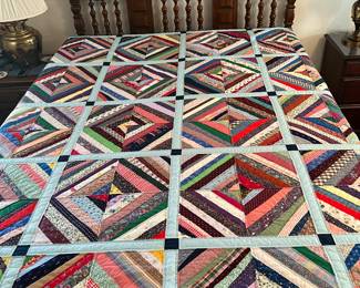 Variation log cabin quilt hand quilted 