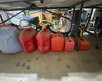 Gas cans, tools, ladders, vases, baskets, garden decor, rocks, 