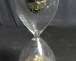 Lot # : 604 - Glass and composite skull hourglass