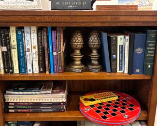 Books, brass book ends, checkers
