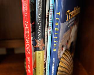 Brass clamshell book ends, books