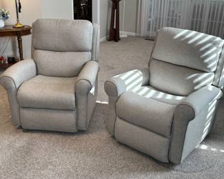 Pair of brand new swivel rocker recliners!