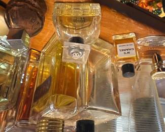 perfumes in various sizes and scents incuding Chanel No. 5
