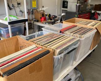 4 boxes of albums 