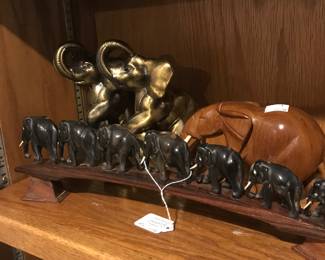 All wooden carved elephants, two brass elephants