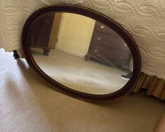 Wooden oval wall mirror