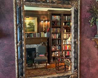 ornate carved wall mirror
