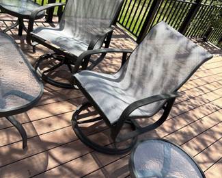outdoor swivel chairs and side tables