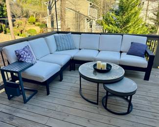 Outdoor sofa with cushions and table