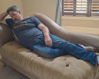 Fat guy on a little couch