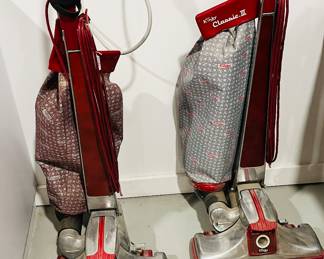 Kirby vacuum cleaners with attachment s.