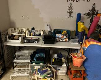 Storage bins, shelves, electrical cords, power strips, plugs, flash lights