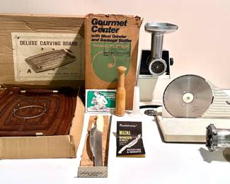 Vintage Hamilton Beach Meat Grinder With Sausage Stuffer, Carving Board, Knife, Slicer & More
Lot #: 88