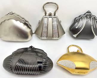 5 Small Hard Shelled Handbags By Daniela, Sasha & More
Lot #: 204