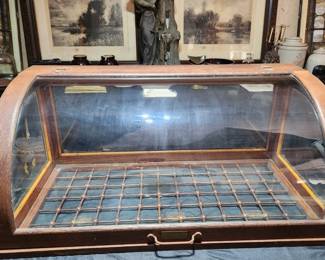 Antique Oscar Onken display case. Wooden grid in bottom was used for displaying canes. TOP SECTION ONLY