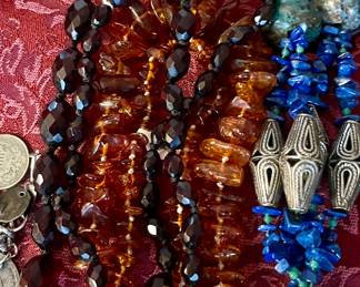 Natural stones, including Amber and other Natural stones.