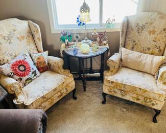 Laine wingback chairs 
Antique ornate wood carved drop leaf side/end table 