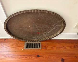 Solid Brass!  Would be beautiful polished!   This piece will not go below 50% off.  Polish it with Sno-bol toilet bowl cleaner.  Easy peezy!   Polished it would be a 200.00 tray.   