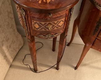 Antique Louis Style side table with brass galleries. Small pull out shelf.