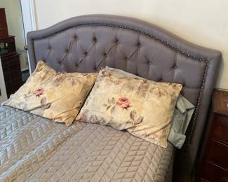 Bed with upholstered head board