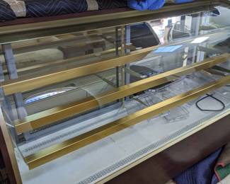 chocolate confection case - temp controlled with glass shelves and trays