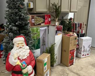 Christmas trees in a variety of sizes, New in Boxes.  Vintage Santa Blow Mold