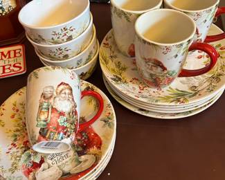 Christmas china.  16 pieces for Set of 4.  There are 2 sets available.  One set is still in their box, we removed one set for display purposes.
