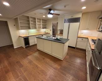 Custom kitchen cabinets, soapstone & butcher-block countertops, glass front upper cabinet doors(not shown in picture).