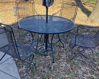 Metal table 4 chairs : was $300 x .30=$90.00