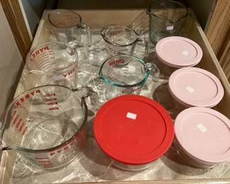 Lots of Pyrex mixing bowls and measuring cups
