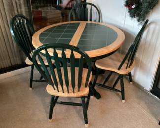 Dining table with four chairs and butterfly leaf