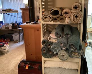 Lots of throw rugs and bathroom rugs