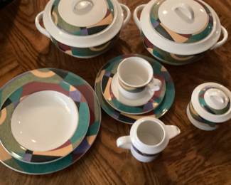 8 pc place setting Studio Nova  Impulse pattern           Comp Price for Each Dinner plate $49.99  $75.00 for set and Serving Pieces