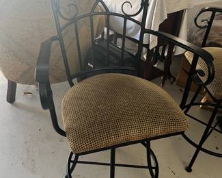 3 Swivel metal counter height stools with material seats$75.00 each