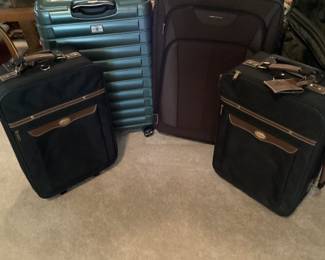 Green suitcase $30.00 (2) $10 ea Purple suitcase $20.00