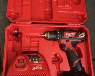 Milwaukee Cordless drill and charger: