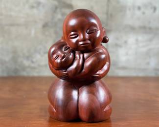 An original carved wood sculpture by listed Brazilian artist, Agenor Silva. Signed on the back as shown in photos and is in very good condition. Agenor Silva is a Brazilian artist who was born in 1940. This sculpture measures 9” H x 5.5” W x 4” D.
