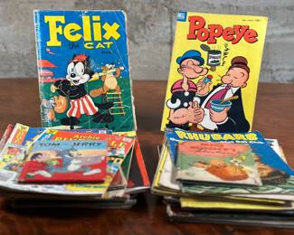 This lot features a large assortment of vintage and antique comic books including Felix The Cat, Popeye, & many others in various conditions. This lot features 29 comic books in total.