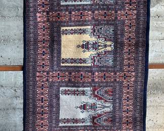 An antique hand made Oriental rug runner in good condition. This hand made Oriental rug measures 79” x 31”. A runner rug is a long, narrow rug that’s usually rectangular in shape. Runners are often used in hallways, entryways, and staircases.