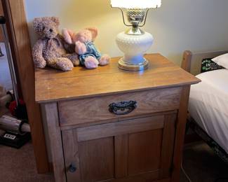 Mission style cabinet with drawer and hobnail table lamp