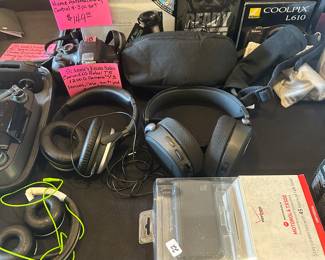 Lots of digital cameras, headphones