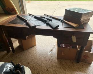 Air guns, pellet bun, office desk