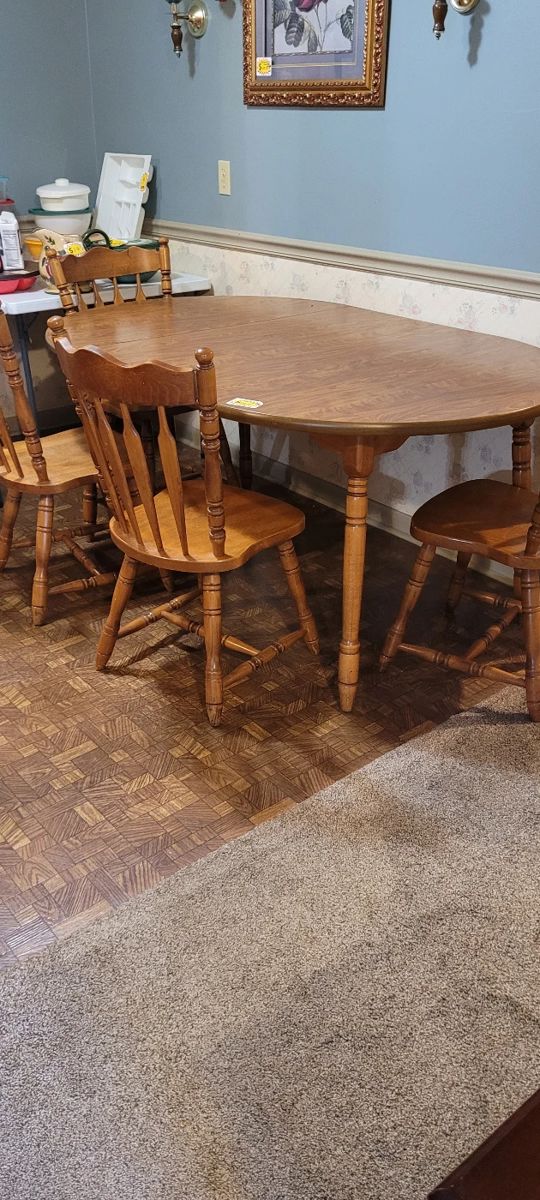 Kitchen table with five chairs.